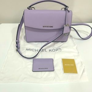 NEVER USED. Purple Michael Kors bag and card holder with silver hardware.
